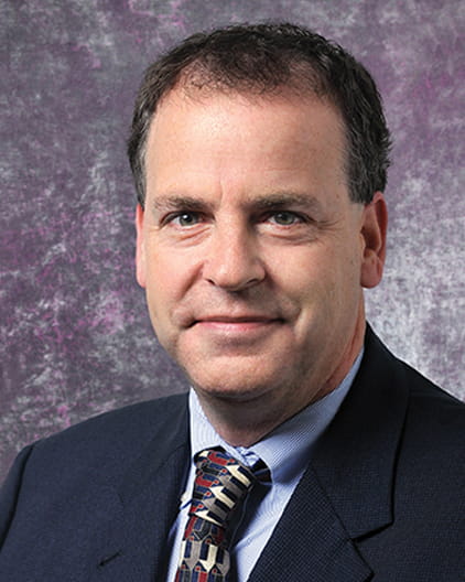 Christopher Bartels, MD, FACS, is a surgical oncologist with specialties in melanoma, thyroid, breast, and colon cancer at UPMC CancerCenter