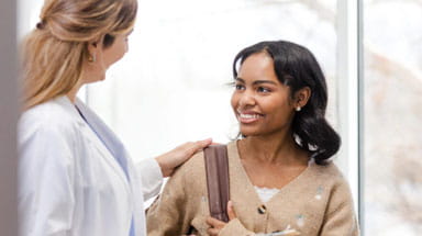 Patient talking to her doctor
